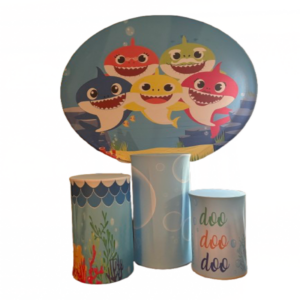 Baby Shark backdrop rental with ocean theme decoration and display cylinders for birthday party