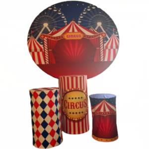 Circus backdrop rental with carnival tent design and decorative display pedestals for party decoration